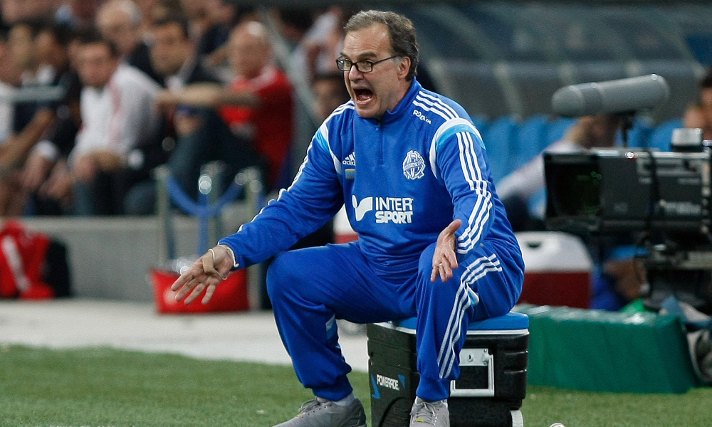 FILE - In this May 10, 2015 file photo, Marseille's coach Marcelo Bielsa, of Argentina, shouts instructions during a League One soccer match between Marseille and Monaco in Marseille, France.  In the latest controversy in his coaching career, Marcelo Bielsa quit as coach of Lazio on Friday, July 8, 2016, just two days after the Italian club announced it signed the former Argentina manager. (AP Photo/Claude Paris, FILE) ORG XMIT: LON116